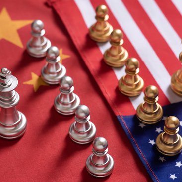 Chess game. Two team stand confront each other on China and USA national flags. Trade war concept.